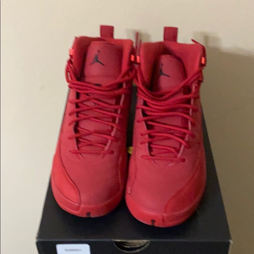 All red Retro Jordan 12.